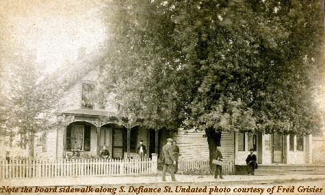 Miles House with board sidewalk